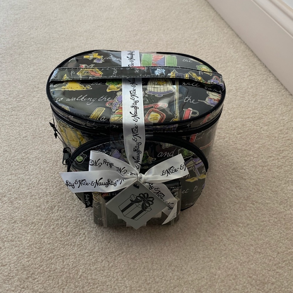 3 pc cosmetic bag gift set, new I never opened it